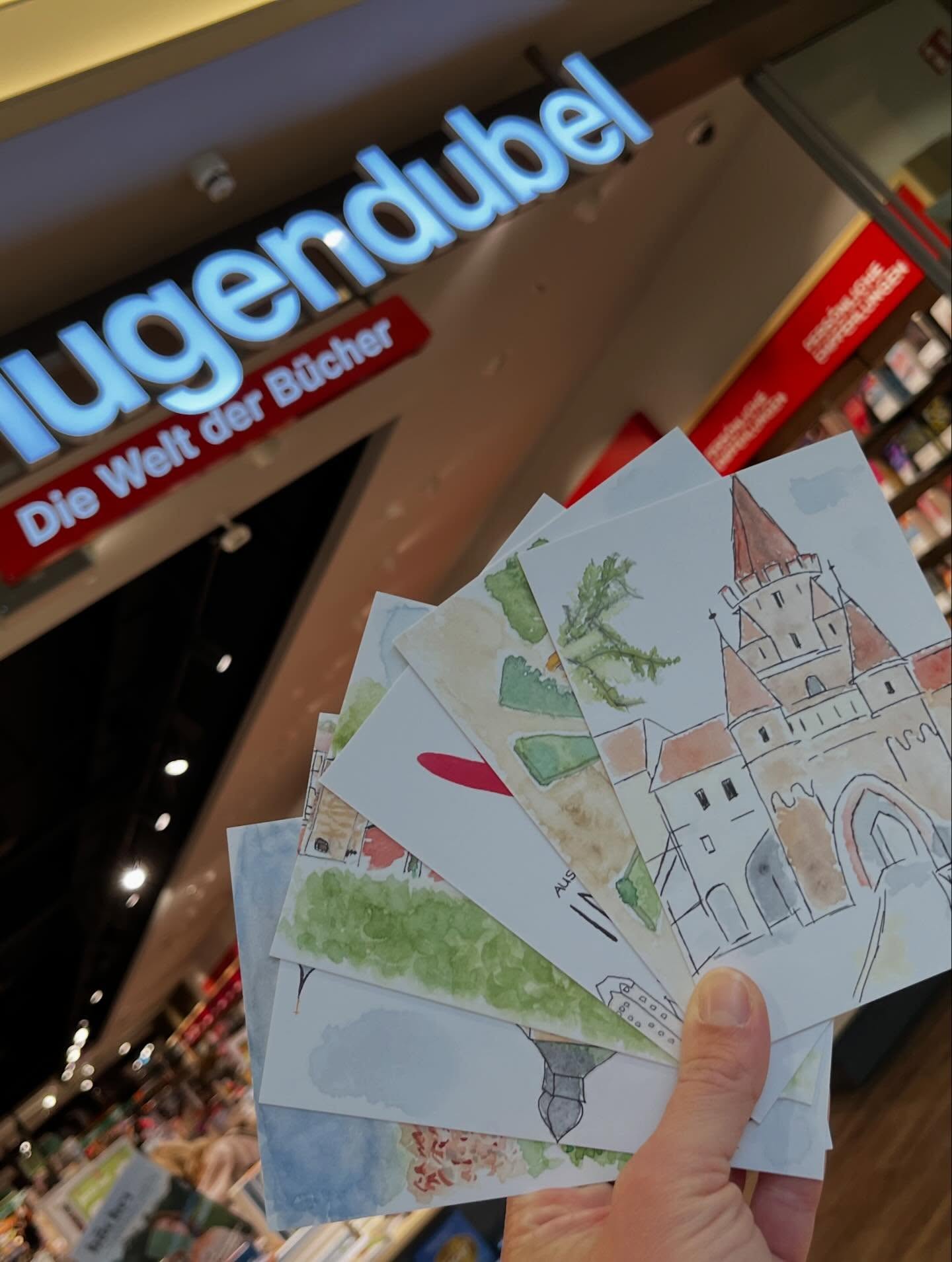 Handgemalte echt, schön Karten vor einem Hugendubel-Laden